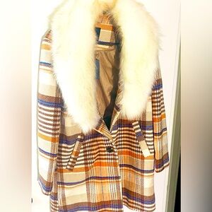 Stylish jumbo fur pea coat